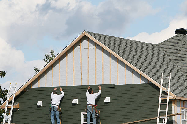 Professional Siding Installation technician working in Great Neck, NY